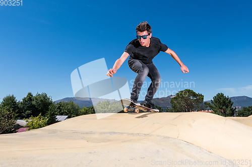 Image of Skateboarder on a pump track park