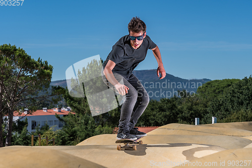 Image of Skateboarder on a pump track park