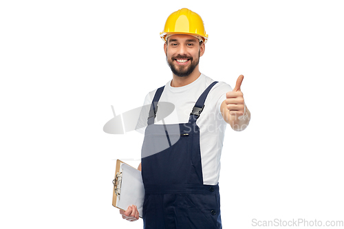 Image of happy worker or builder showing thumbs up