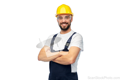 Image of male worker or builder with crossed arms