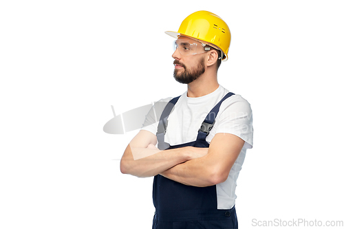 Image of male worker or builder with crossed arms