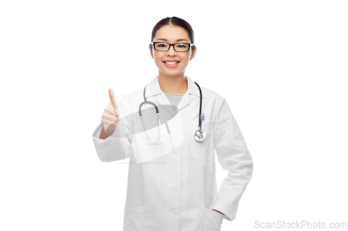 Image of smiling asian female doctor showing thumbs up