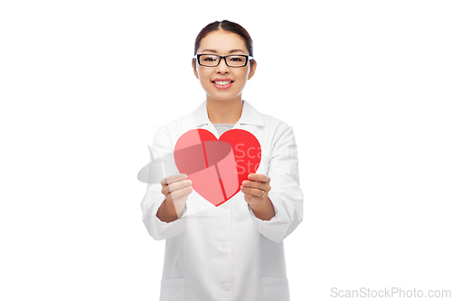 Image of happy smiling asian female doctor with red heart