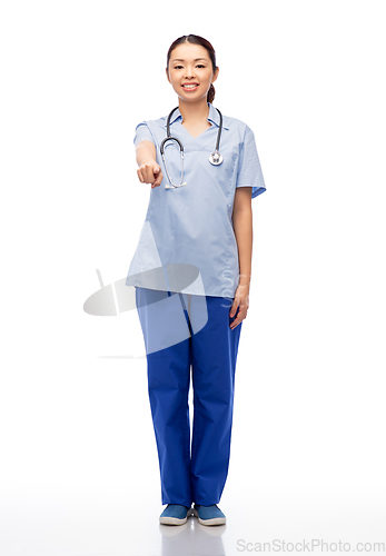 Image of smiling asian female doctor or nurse in uniform