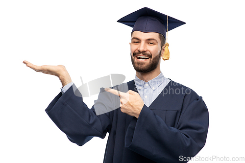 Image of graduate student in mortar board and bachelor gown