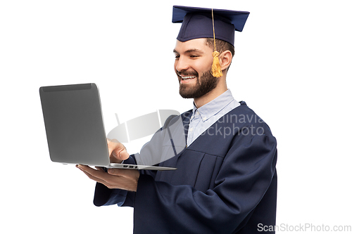 Image of male graduate student or bachelor with laptop