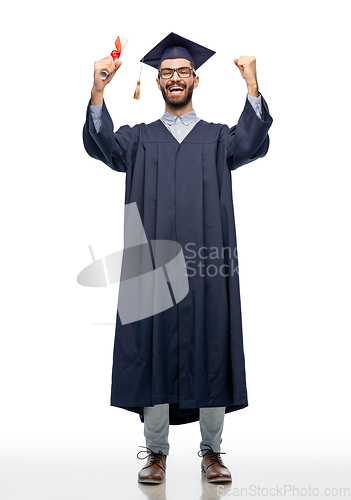 Image of male graduate student in mortar board with diploma