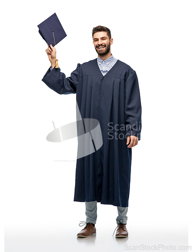 Image of graduate student in bachelor gown with mortarboard