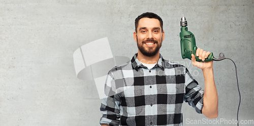 Image of happy man, worker or builder with drill