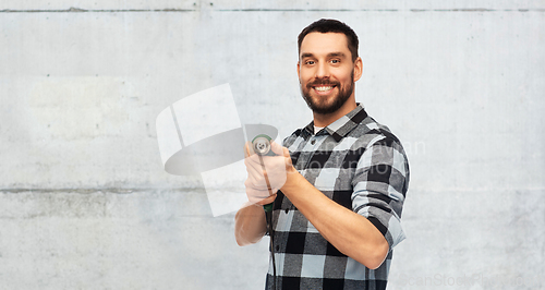 Image of happy man, worker or builder with drill