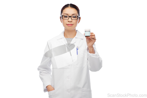 Image of asian female doctor or nurse with medicine