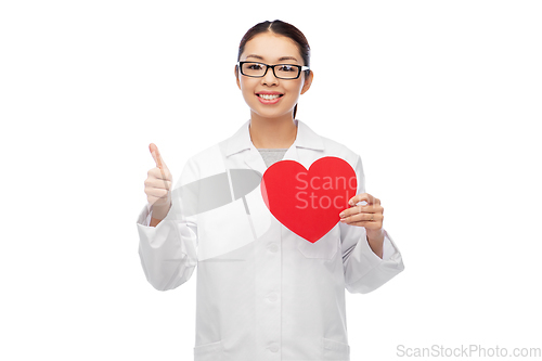 Image of happy smiling asian female doctor with red heart