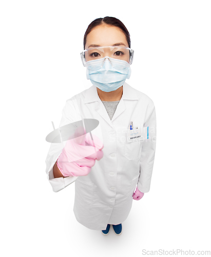 Image of asian female doctor in mask, goggles and gloves