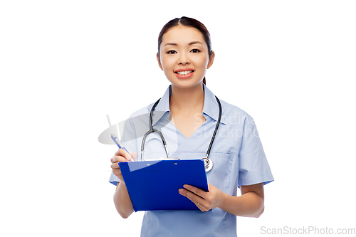 Image of happy smiling asian female doctor with clipboard