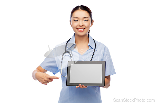 Image of asian female doctor with tablet pc and stethoscope