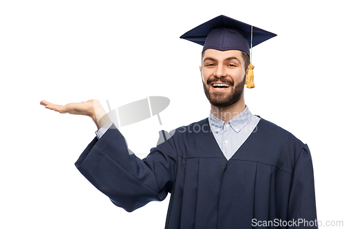 Image of graduate student in mortar board and bachelor gown