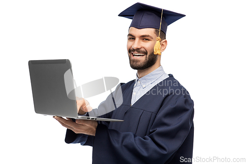 Image of male graduate student or bachelor with laptop