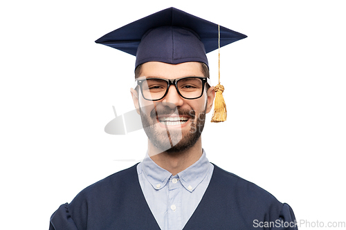 Image of graduate student in mortar board and bachelor gown