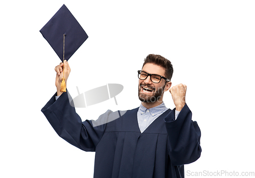 Image of happy graduate student with mortar board