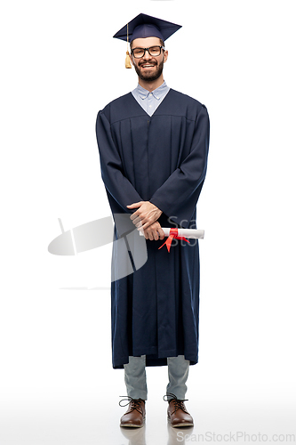 Image of male graduate student in mortar board with diploma