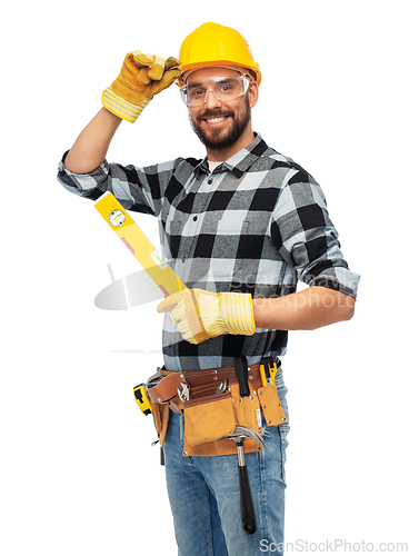 Image of happy male worker or builder in helmet with level