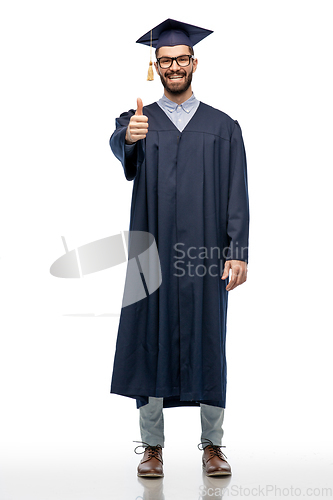 Image of happy male graduate student showing thumbs up