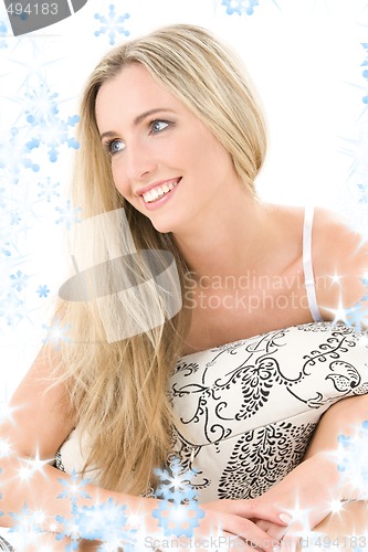 Image of happy blonde with pillow