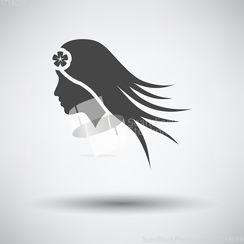 Image of Woman head with flower in hair icon