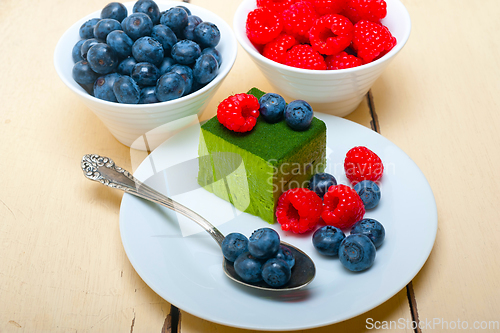 Image of green tea matcha mousse cake with berries