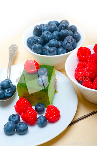 Image of green tea matcha mousse cake with berries