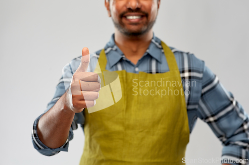 Image of indian male gardener or farmer showing thumbs up