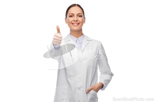 Image of smiling female doctor showing thumbs up