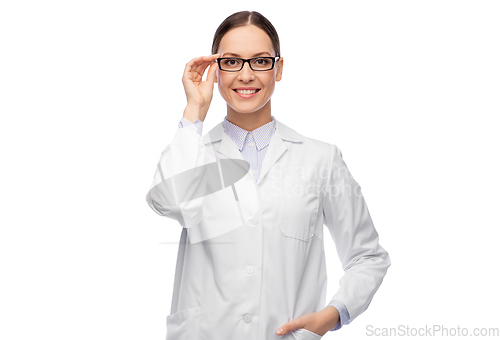 Image of smiling female doctor in glasses and white coat