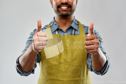 Image of indian male gardener or farmer showing thumbs up