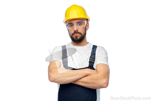 Image of male worker or builder with crossed arms