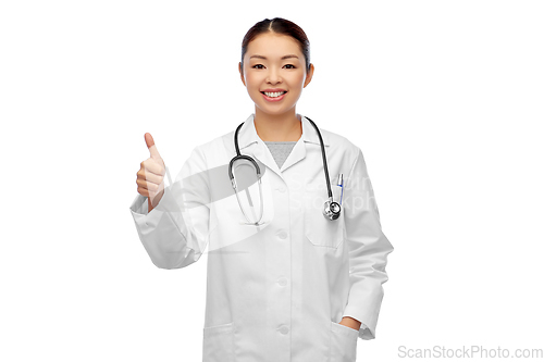 Image of smiling asian female doctor showing thumbs up