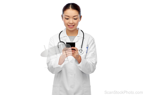 Image of happy asian female doctor or nurse with smartphone