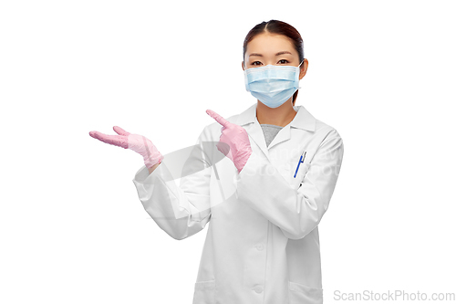 Image of asian female doctor or scientist in medical mask