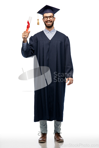 Image of male graduate student in mortar board with diploma