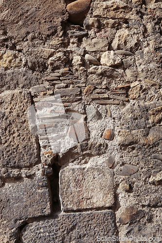 Image of Texture of an old wall of stones and bricks