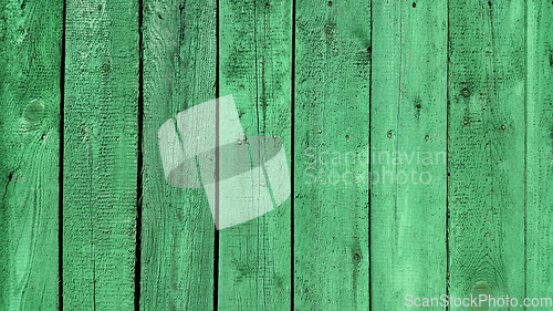 Image of Texture of weathered wooden green painted fence