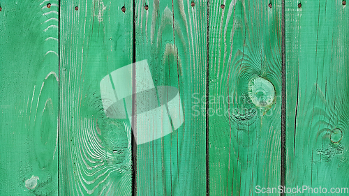 Image of Texture of weathered wooden green painted fence