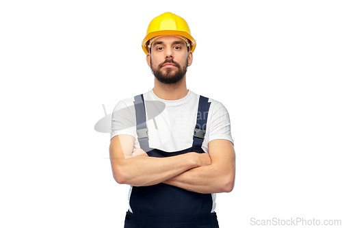 Image of male worker or builder with crossed arms