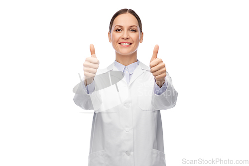 Image of smiling female doctor showing thumbs up