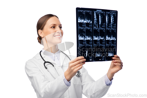 Image of happy smiling female doctor with x-ray