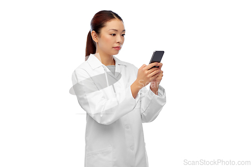 Image of asian female doctor or nurse with smartphone