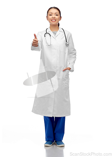 Image of smiling asian female doctor showing thumbs up