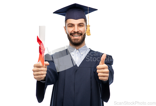 Image of male graduate student in mortar board with diploma