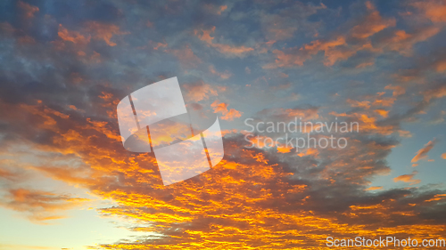 Image of Fiery sunrise sky background