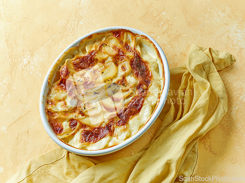 Image of bowl of freshly baked potato gratin